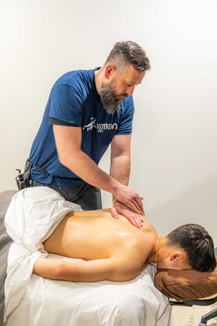 Igor Kodzic providing a personalized massage at Motion Bodyworx